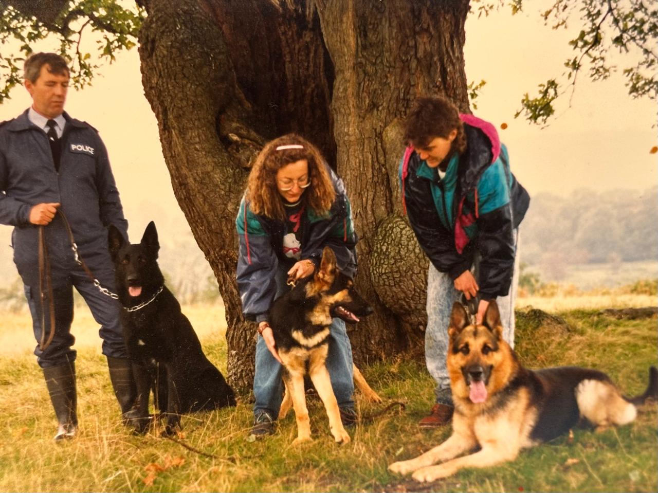 Photo of the breeders in 1994 with the police and their Olderhill GSDs